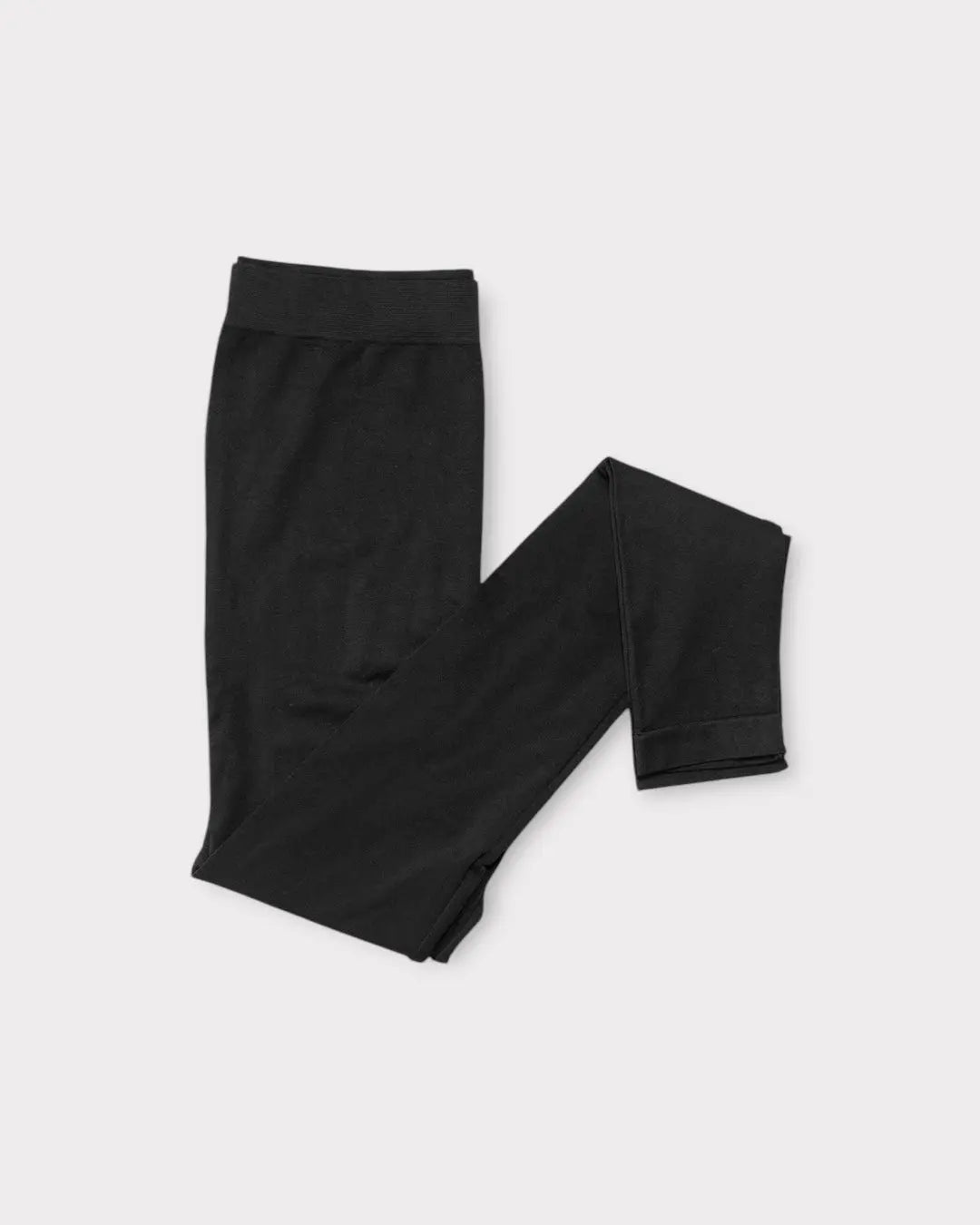 Basic Leggins in Schwarz gefaltet